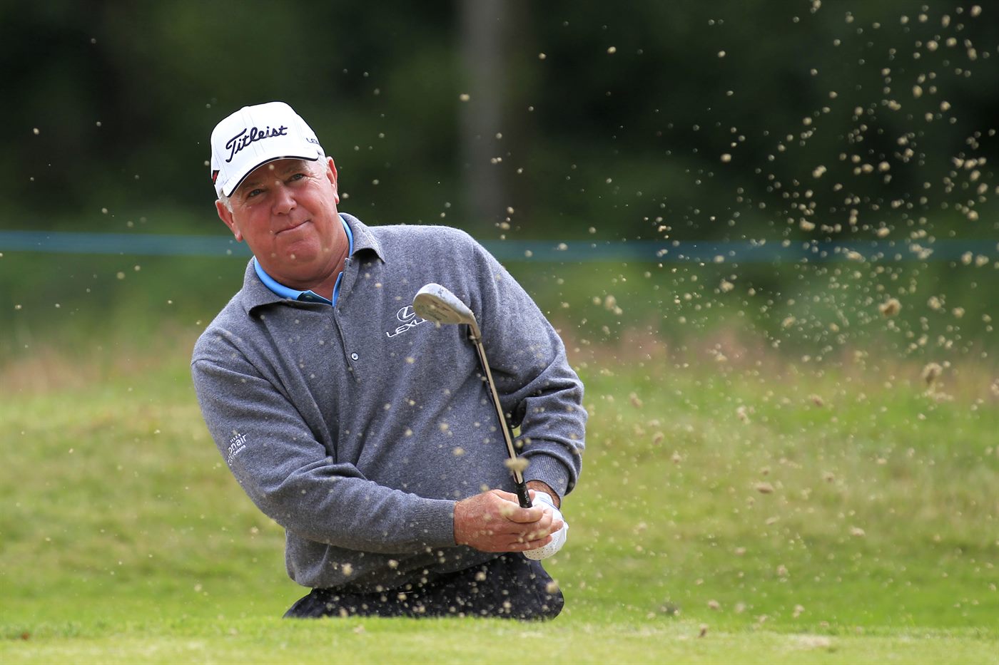 Mark O'Meara playing a bunker shot at Buenos Aires Golf Club