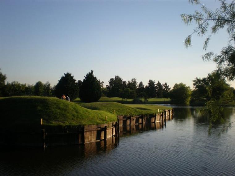 The central lake running alongside the fairway